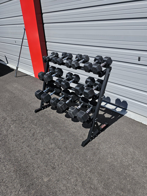 5-50lb dumbbells in 5lb increments with storage rack