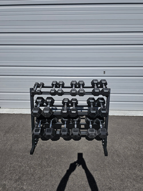 5-50lb dumbbells in 5lb increments with storage rack